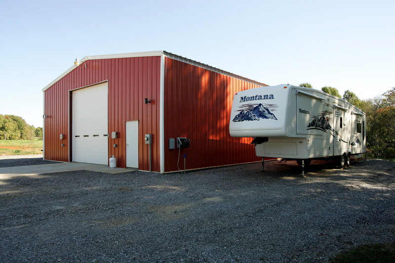 red steel building kit, white door, white trim