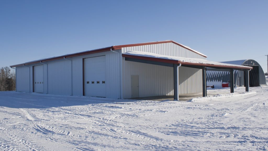 White Steel Building in snow