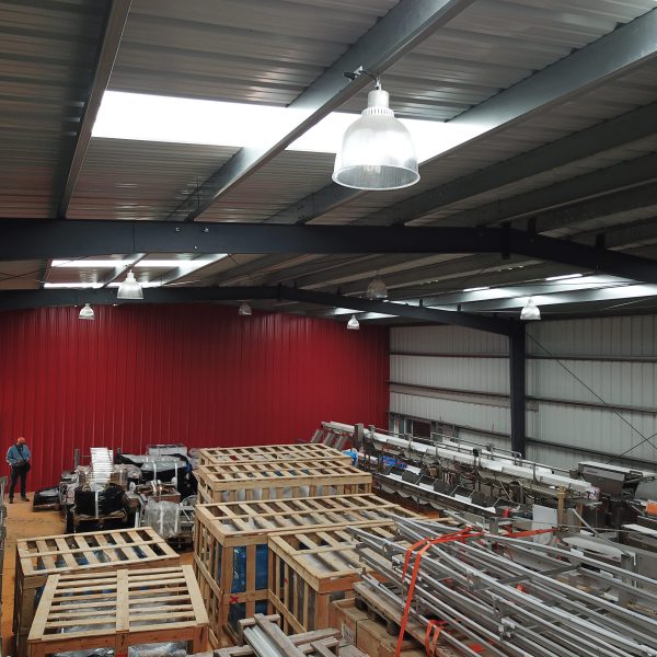 Inside the Punta Arenas, Chile storage warehouse with skylights and clear-spanned frame