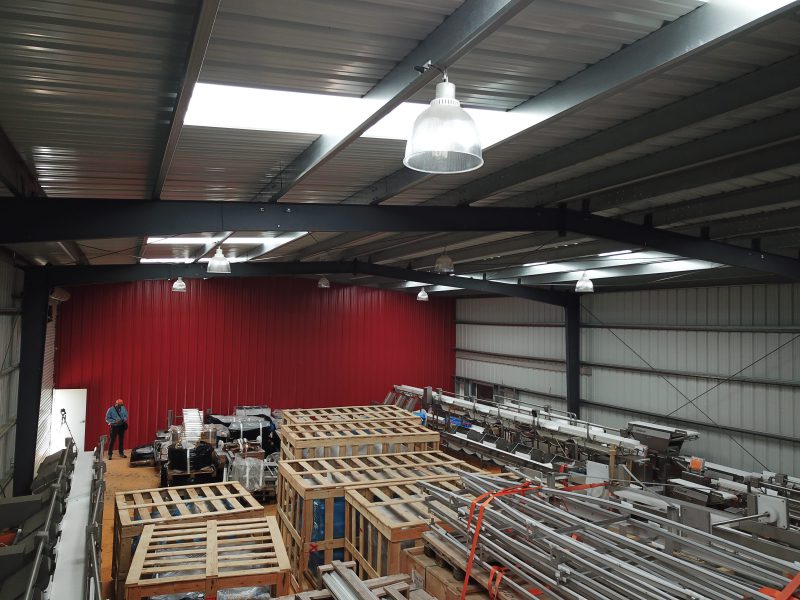 Inside the Punta Arenas, Chile storage warehouse with skylights and clear-spanned frame