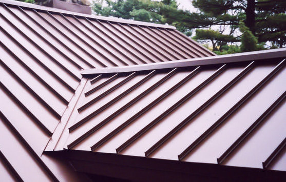 Red steel building standing seam roof