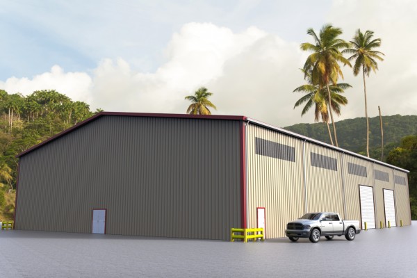 Tan steel building with red trim, wall lights and overhead garage doors.