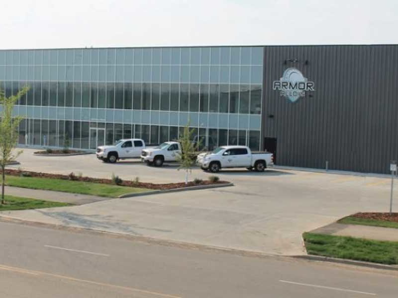 Commercial Steel Buildings for Armor Alloys Office. 240x100 Gray Steel Building located in Edmonto Alberta, Canada