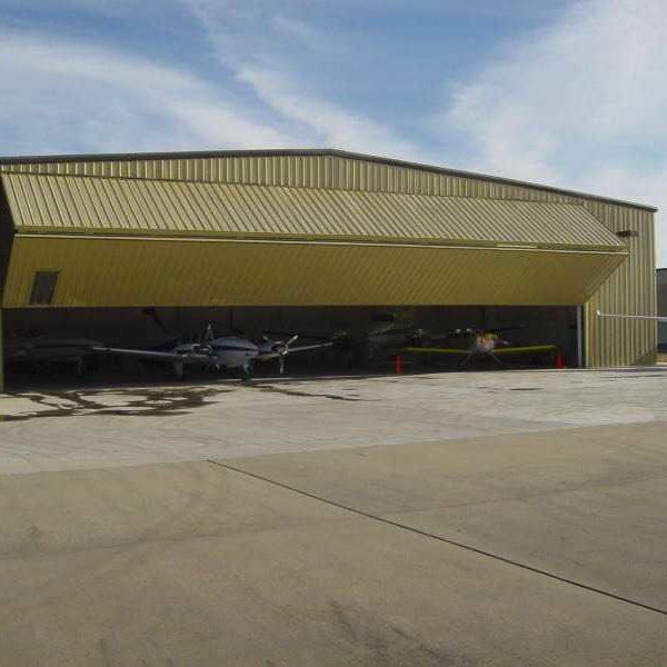 70x120 tan Aviation Bifold Hangar located in Septlles-Quebec, Canada