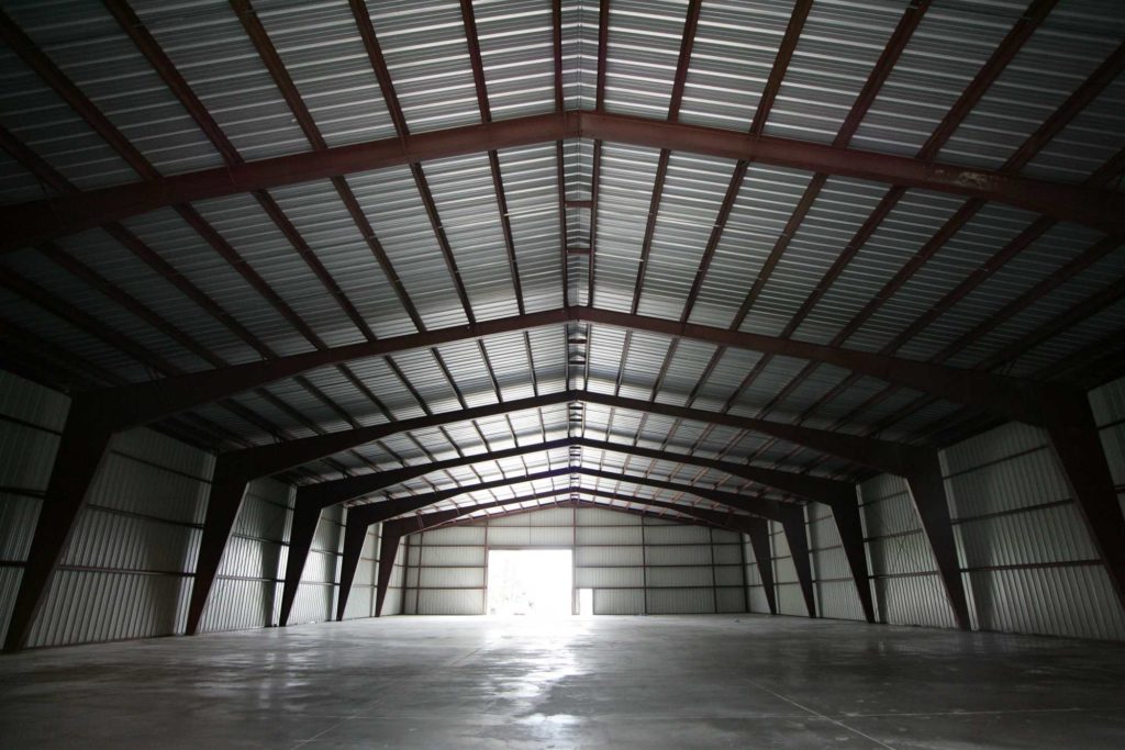 Beige 100x180x24 Agricultural Steel Building. located in Mactier, Ontario.