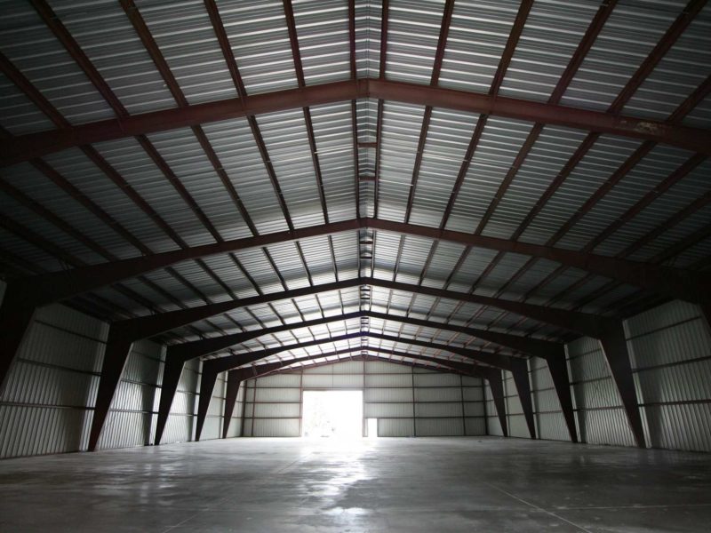 Beige 100x180x24 Agricultural Steel Building. located in Mactier, Ontario.