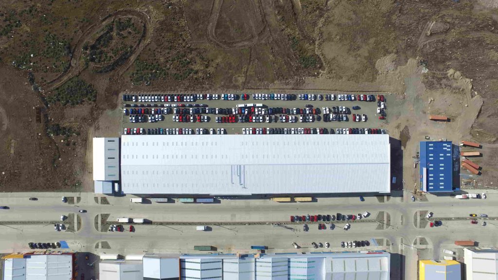large steel building warehouse in Chile, aerial view