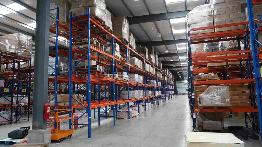 Steel building warehouse with racks for storage