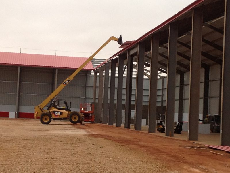 Allied Steel employees on jobsite engineering a steel industrial canopy in Angola