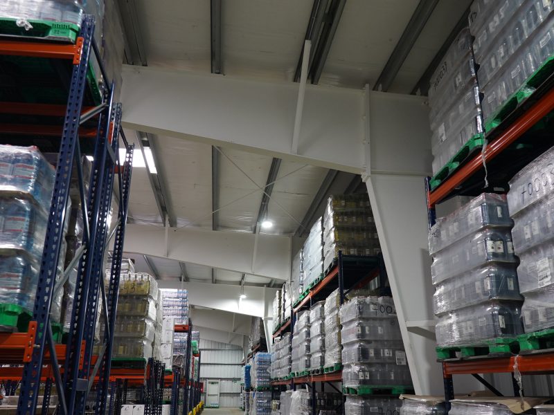 Inside the storage warehouse with clear-span gable symmetrical frame